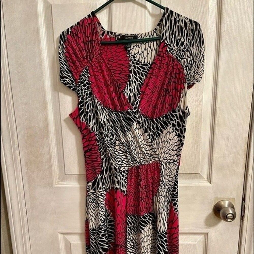 Alfani dress. Wrap style but not actual wrap. Vibrant colors. Stretchy/comfy.